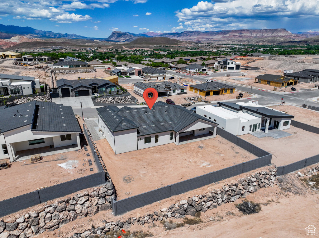 Aerial view of residential area with mountains