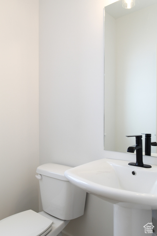 Bathroom with toilet and a sink