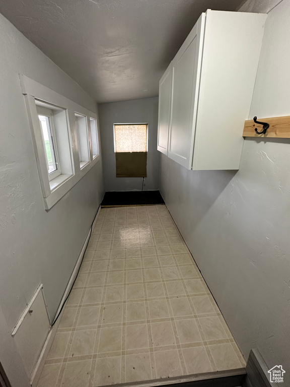 Corridor with light flooring