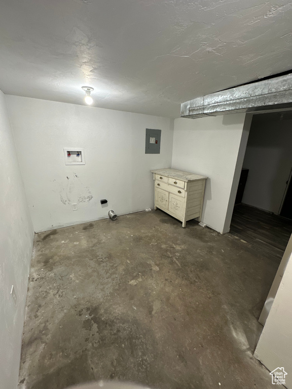 Finished basement with electric panel