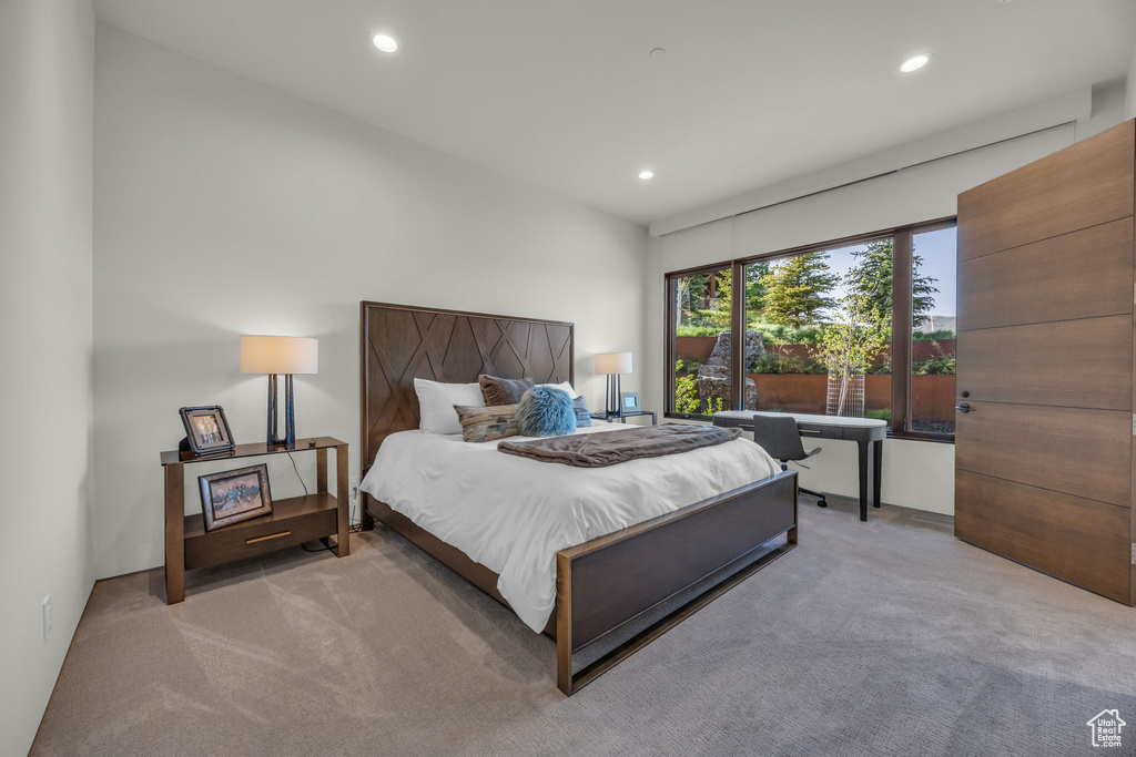 Carpeted bedroom featuring recessed lighting