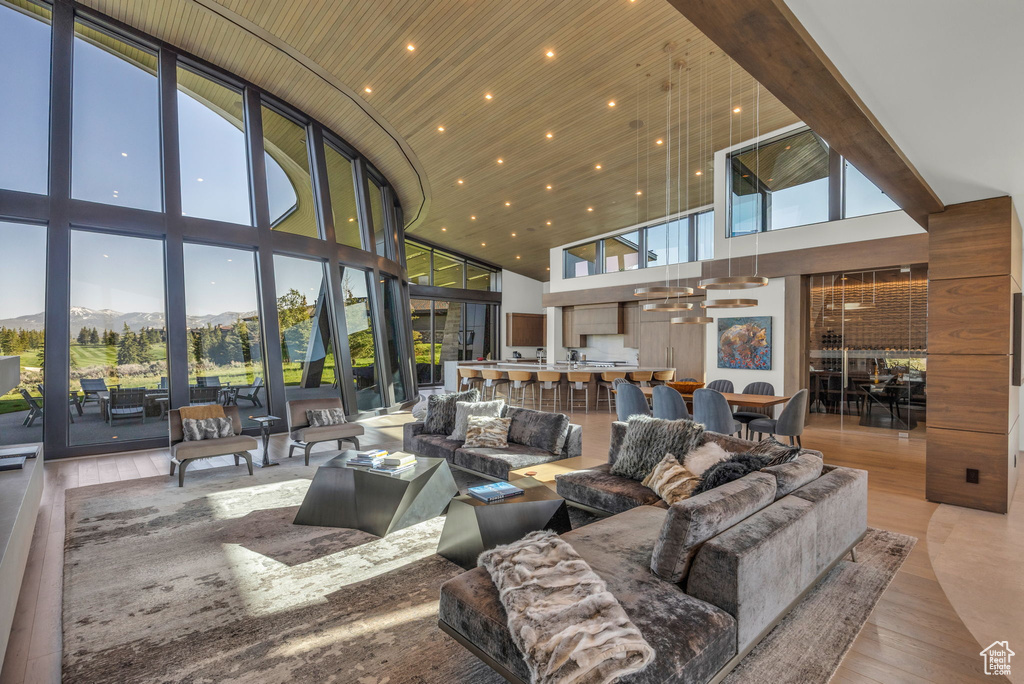 Lobby with a high ceiling, a mountain view, and recessed lighting