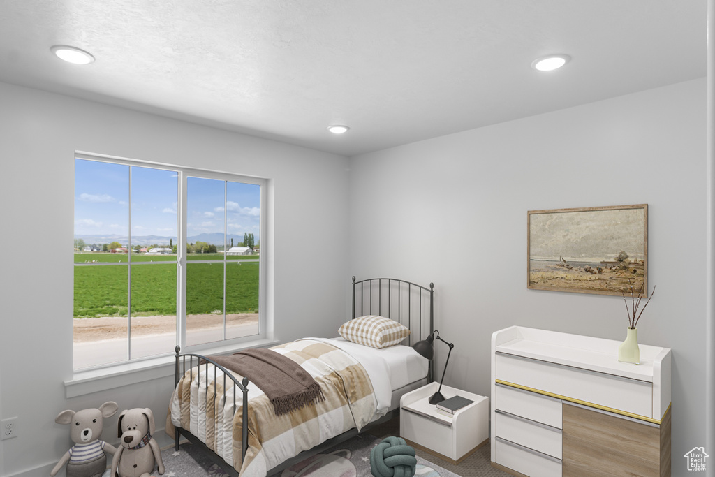 Carpeted bedroom featuring recessed lighting