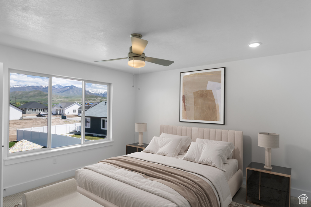 Bedroom with baseboards, recessed lighting, and a ceiling fan