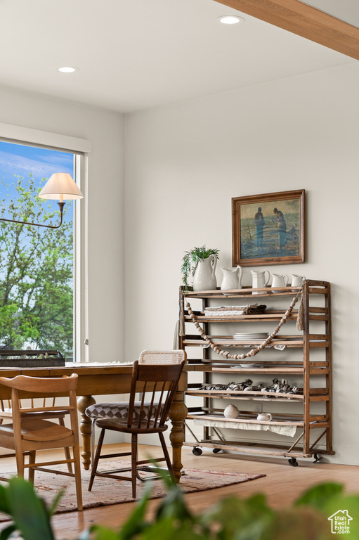 Dining room featuring wood finished floors and recessed lighting