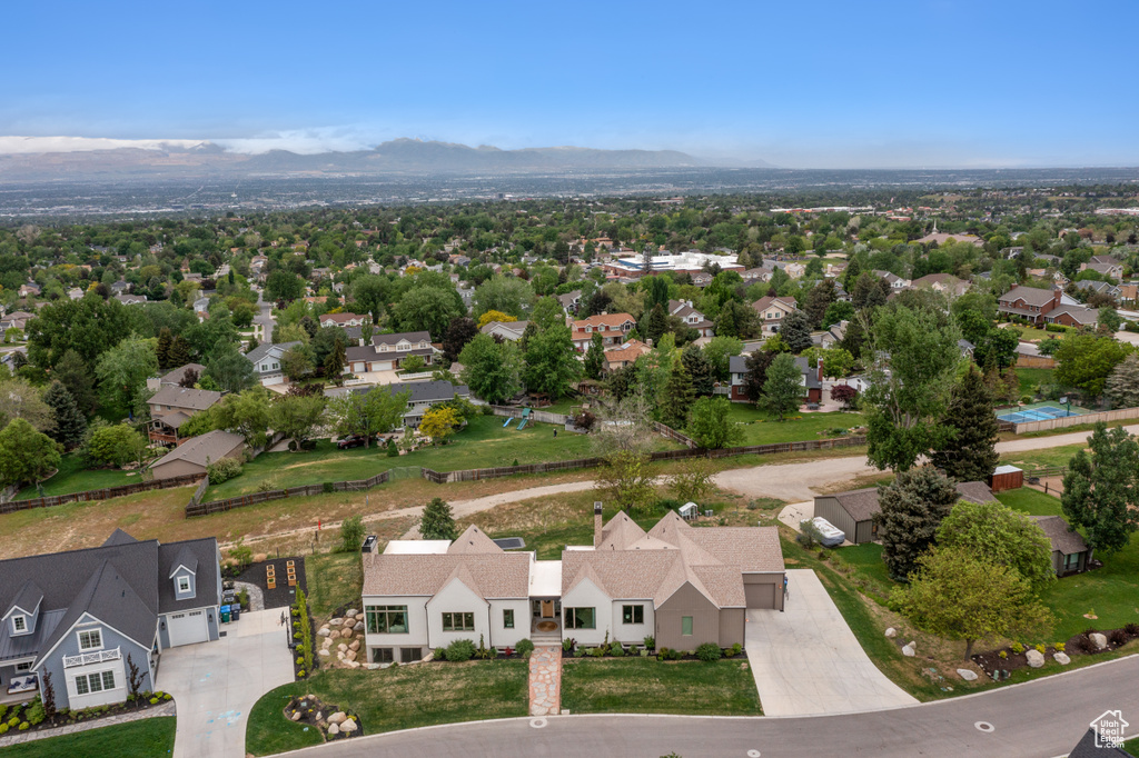 Aerial view of residential area with mountains