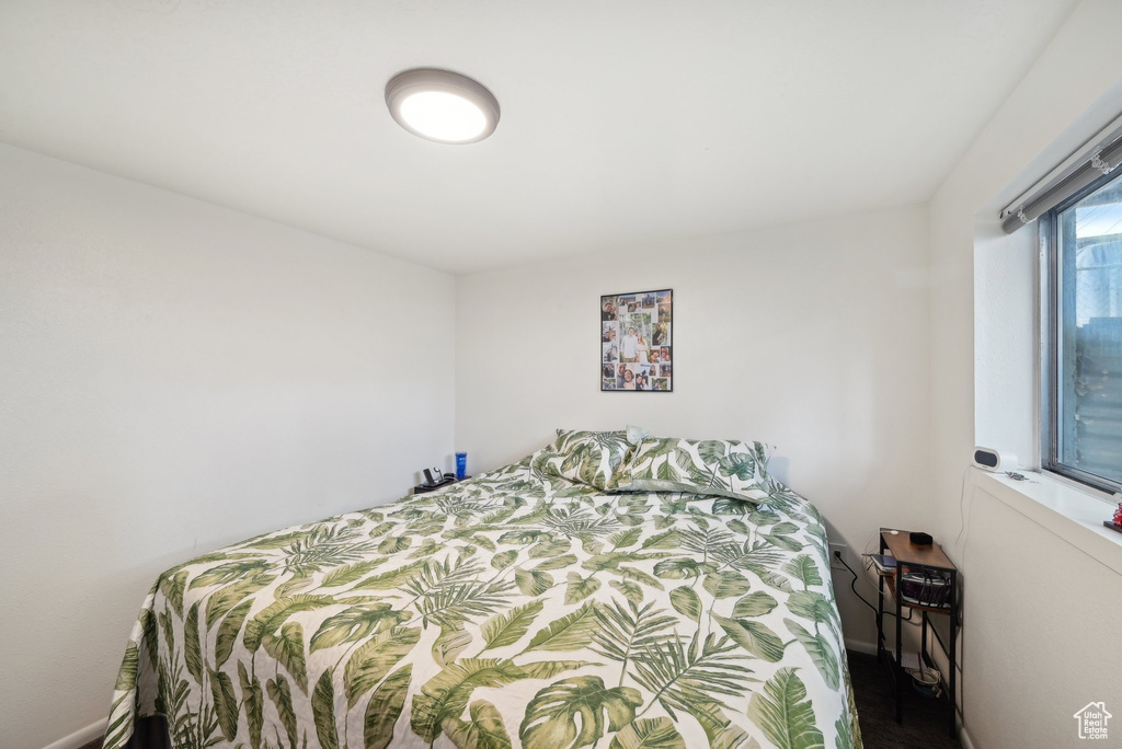 Bedroom featuring baseboards