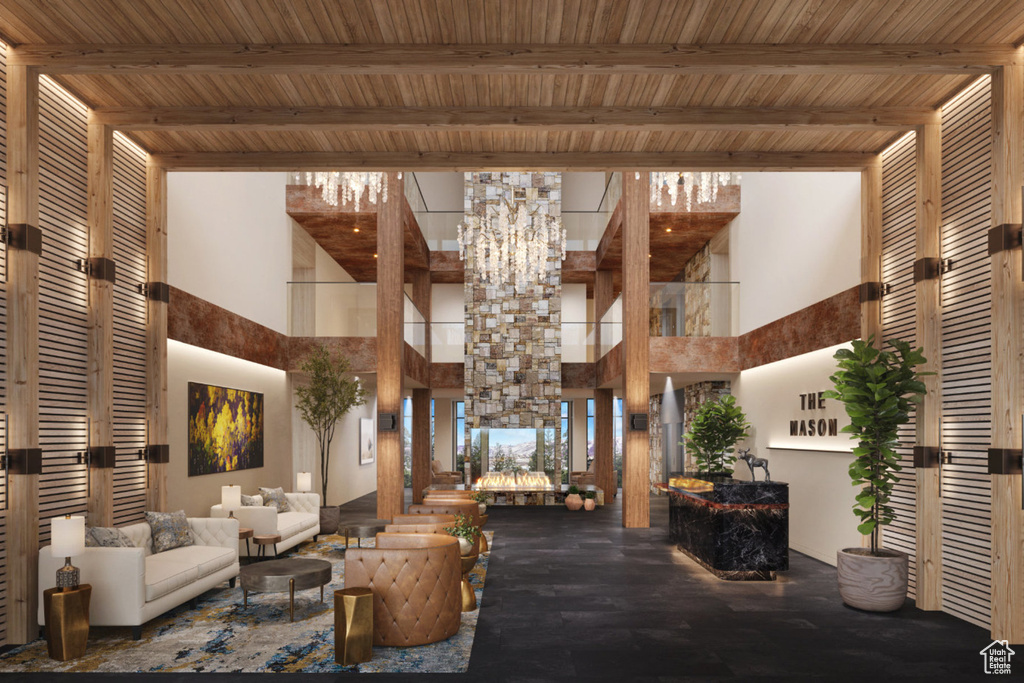 Community lobby featuring a high ceiling and beamed ceiling