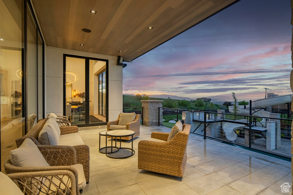 View of balcony at dusk
