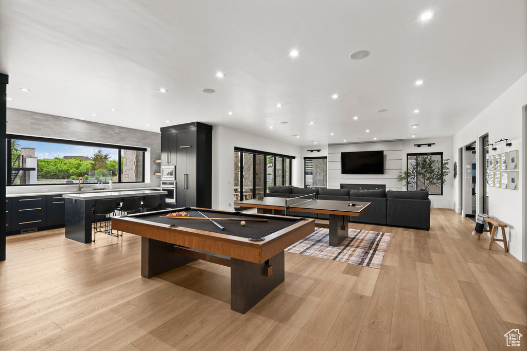 Recreation room featuring light wood finished floors, recessed lighting, and billiards