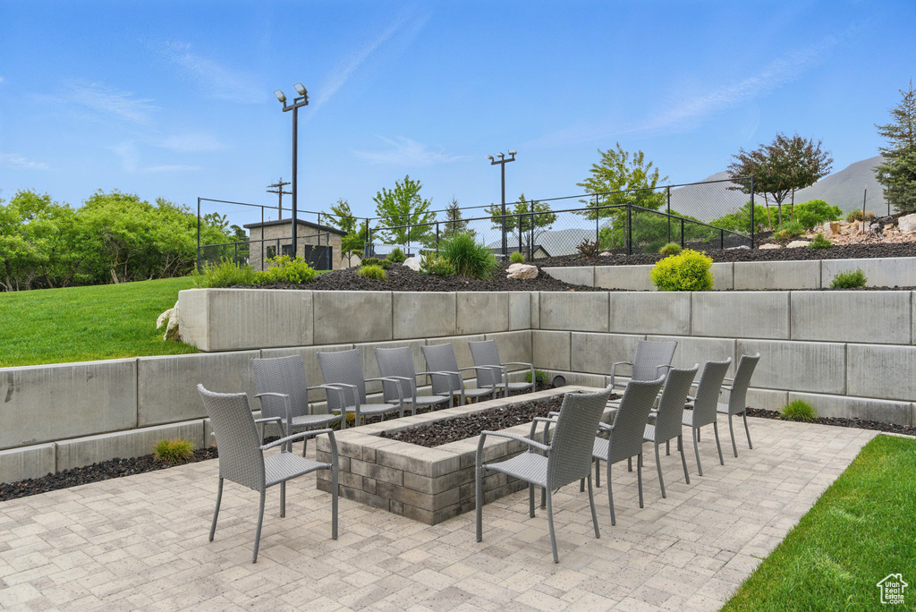 View of patio / terrace with a fire pit