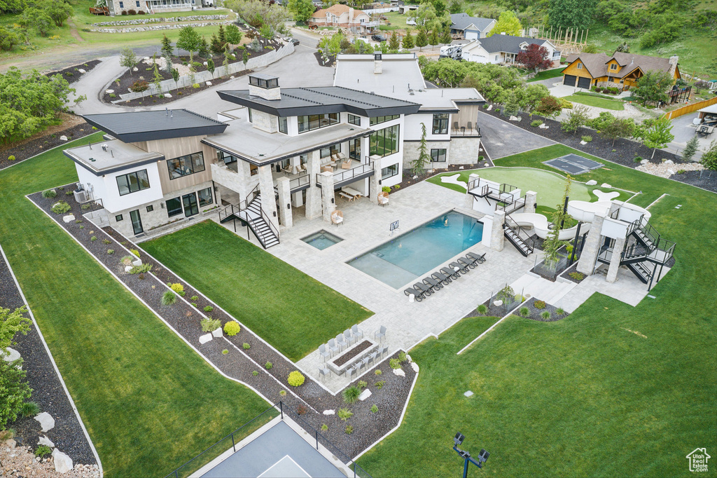 Aerial view of residential area with a pool