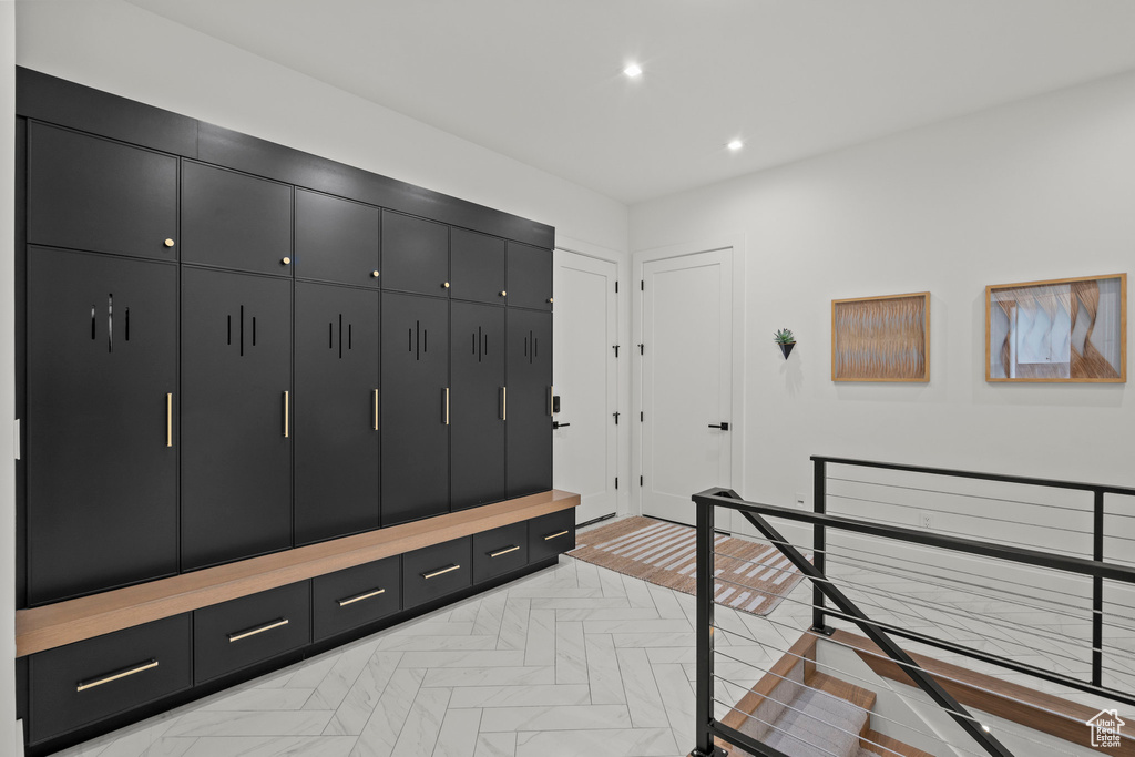 Mudroom featuring recessed lighting