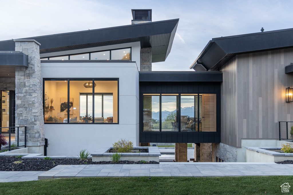 View of front of property with stone siding