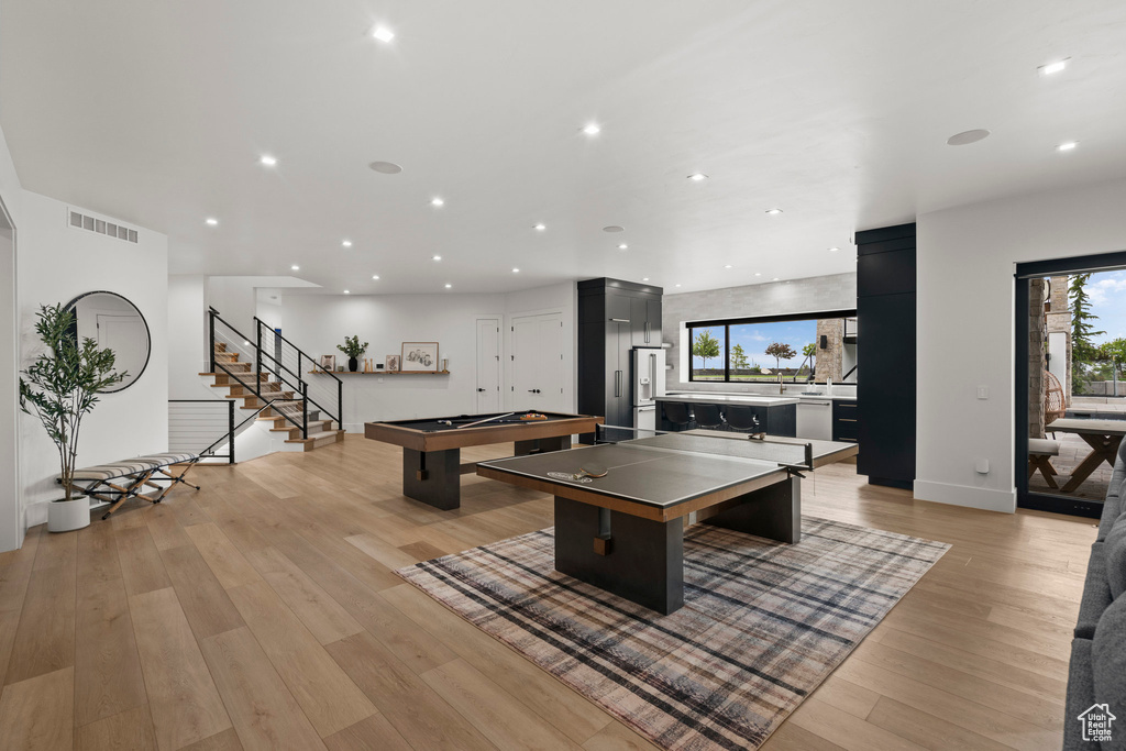 Playroom with recessed lighting, light wood-style floors, billiards table, and baseboards