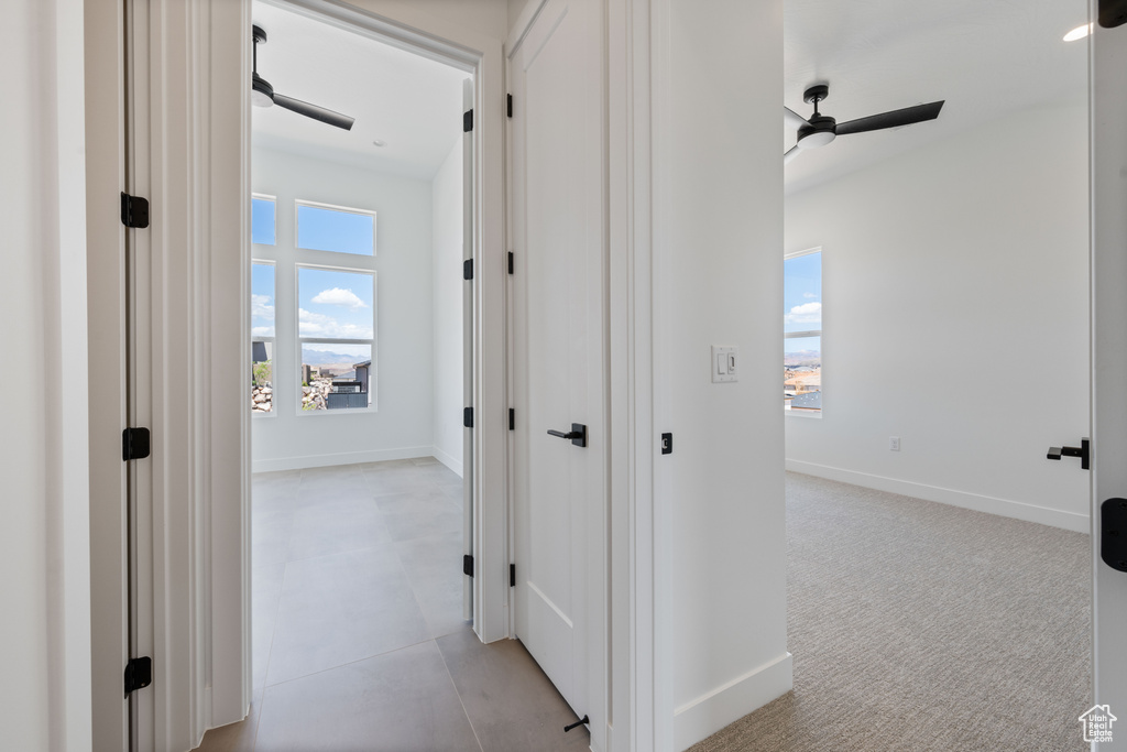 Hall featuring baseboards