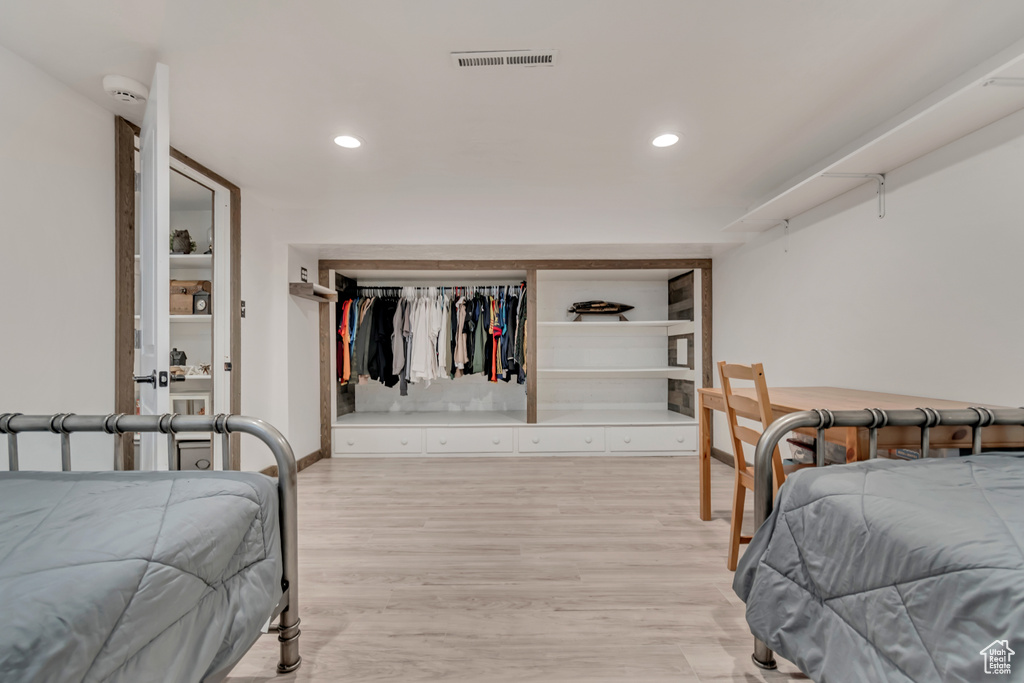 Bedroom featuring recessed lighting and light wood-type flooring