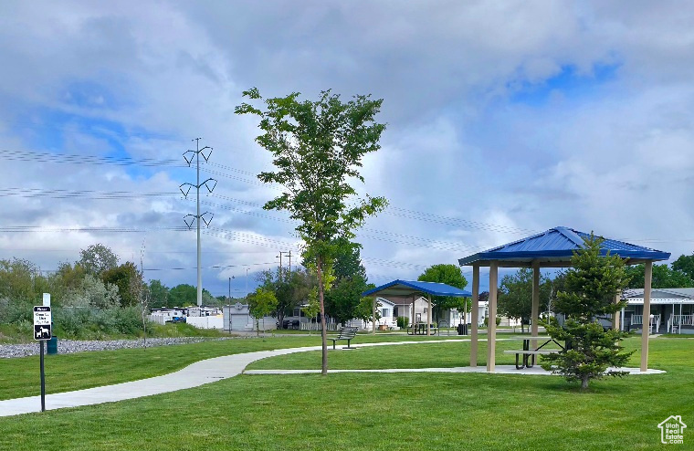 View of community featuring a gazebo and a lawn