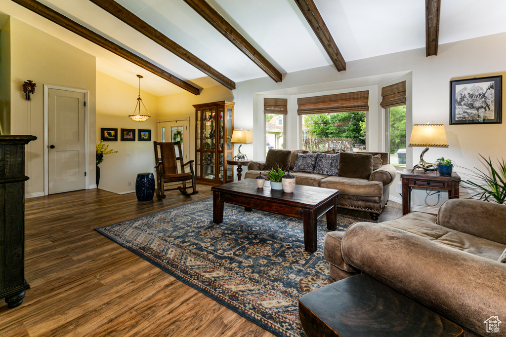 Living room featuring wood finished floors and baseboards