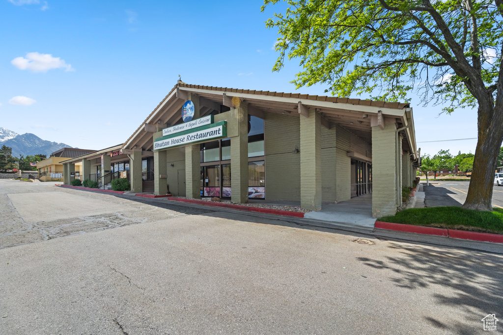 View of building exterior featuring a mountain view