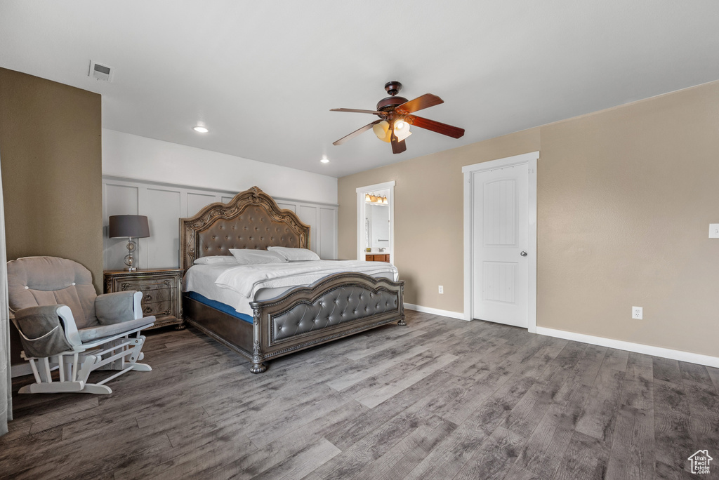 Bedroom featuring wood finished floors, baseboards, recessed lighting, and a ceiling fan
