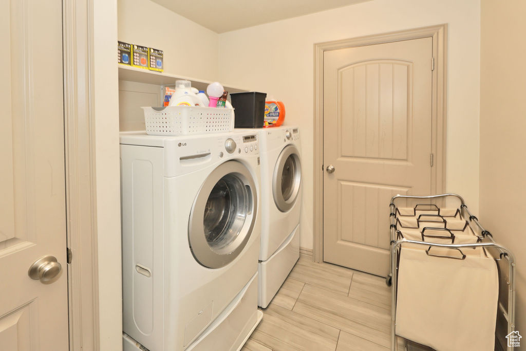 Laundry room with separate washer and dryer