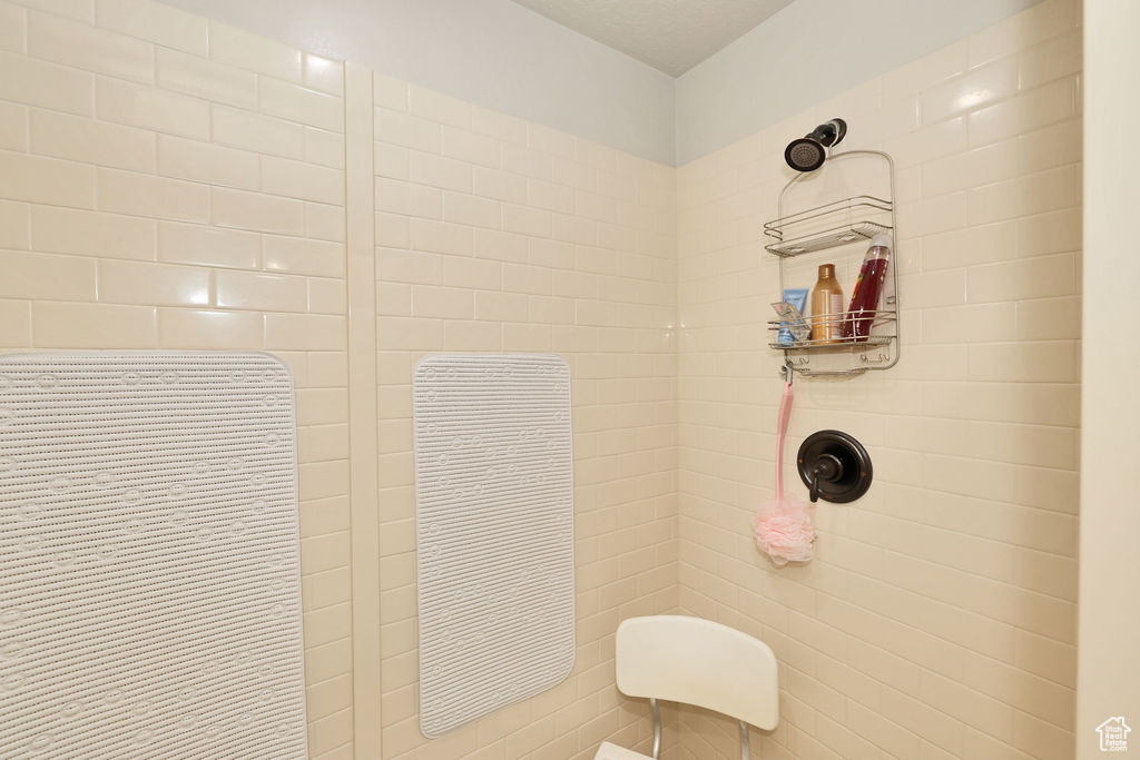 Bathroom with a tile shower