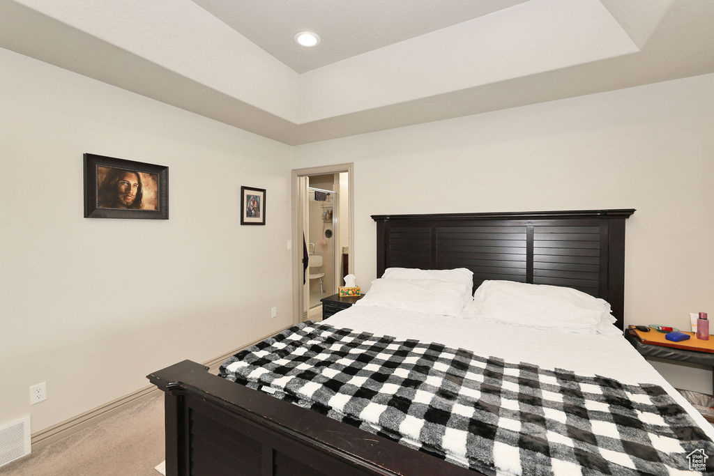 Bedroom with light carpet, baseboards, and recessed lighting