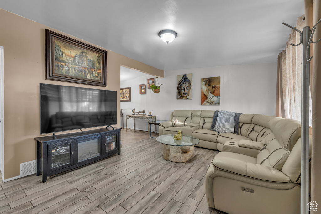 Living area featuring light wood-type flooring