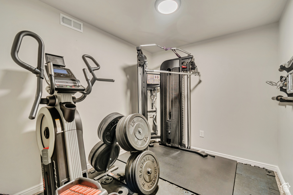 Exercise room featuring baseboards