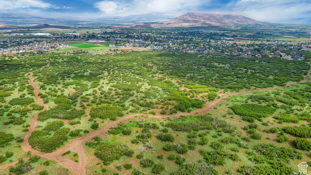 Aerial view of property\'s location featuring mountains