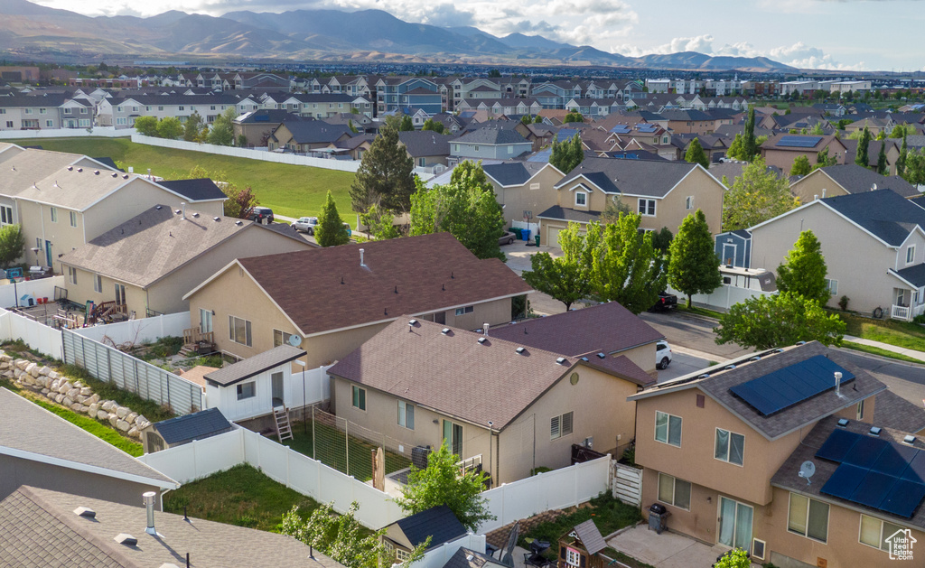 Aerial perspective of suburban area featuring mountains