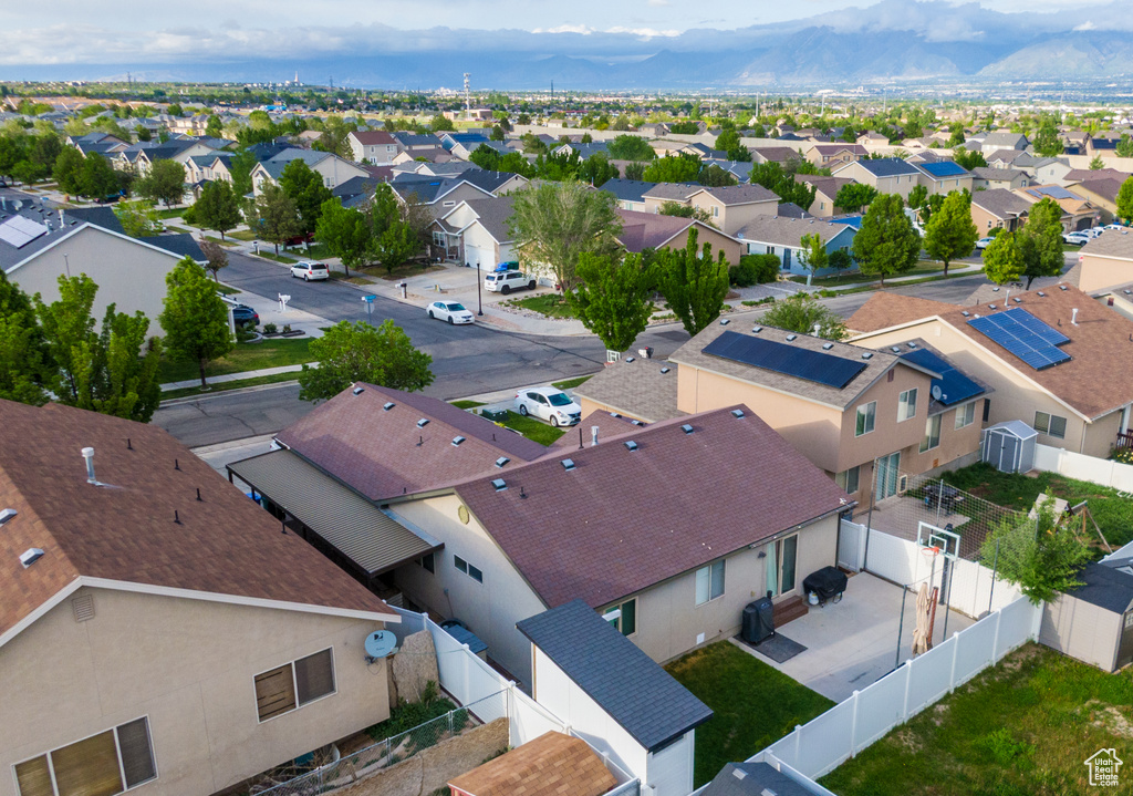 Aerial view of residential area with mountains