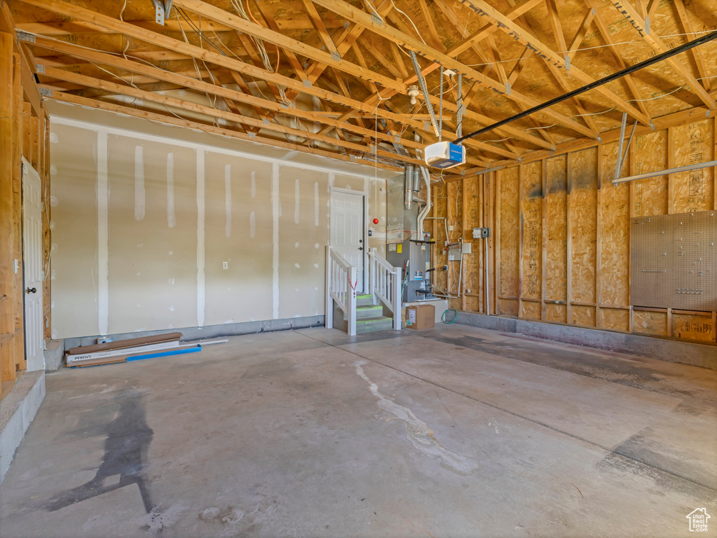 Garage with a garage door opener and heating unit