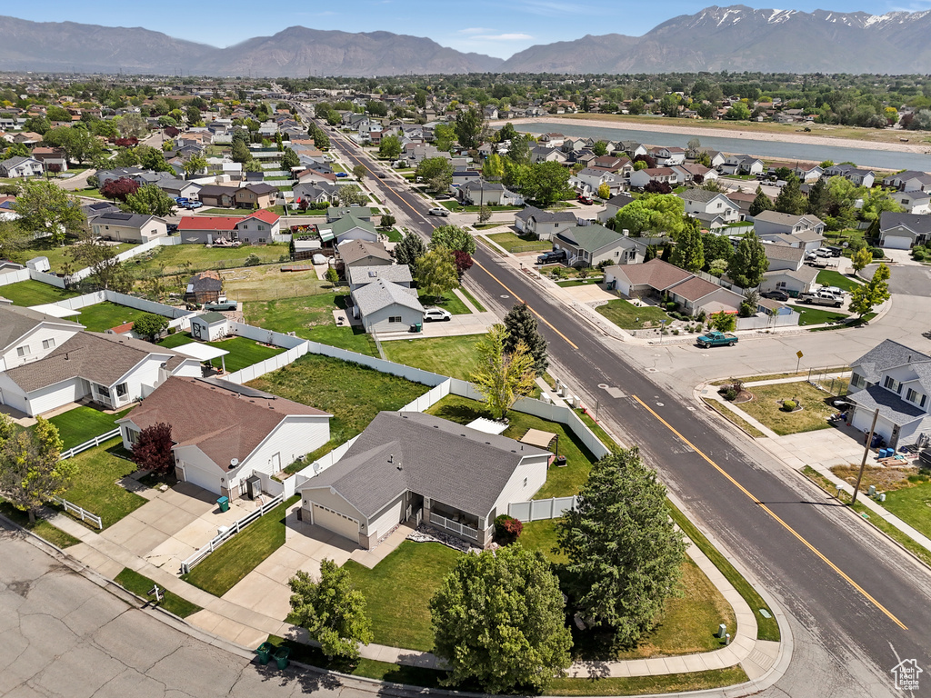 Aerial view of residential area featuring mountains