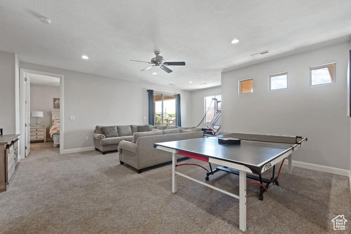 Playroom featuring ceiling fan, recessed lighting, baseboards, and light colored carpet