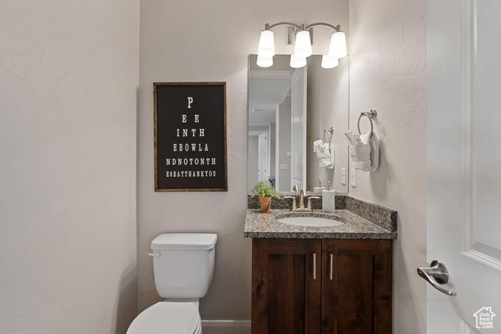 Bathroom with toilet and vanity