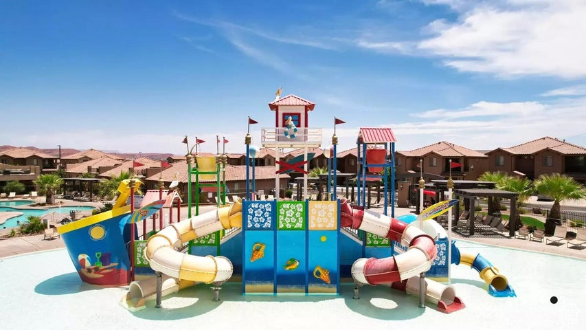 Community play area featuring a water play area and a residential view