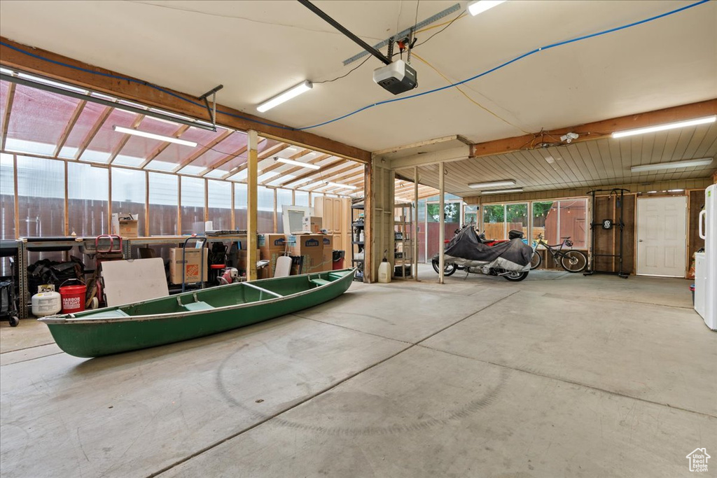 Garage featuring a garage door opener