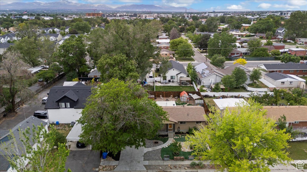 Aerial view of residential area with a mountainous background