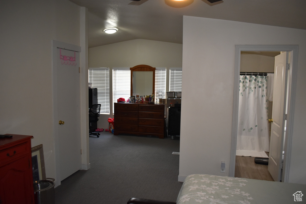 Bedroom with lofted ceiling and ensuite bath