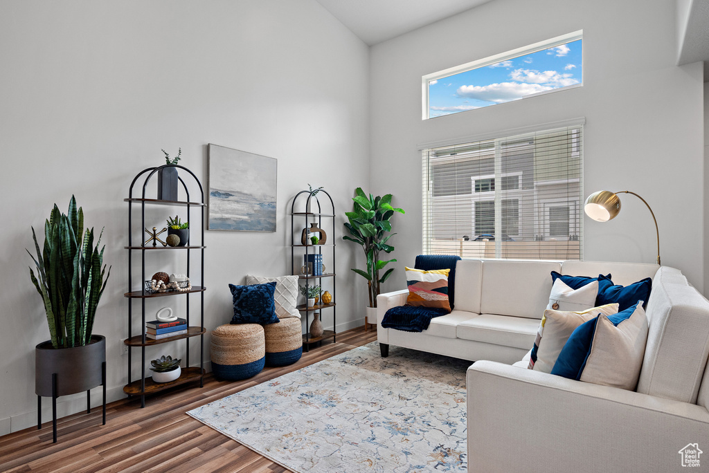 Living area featuring wood finished floors and baseboards