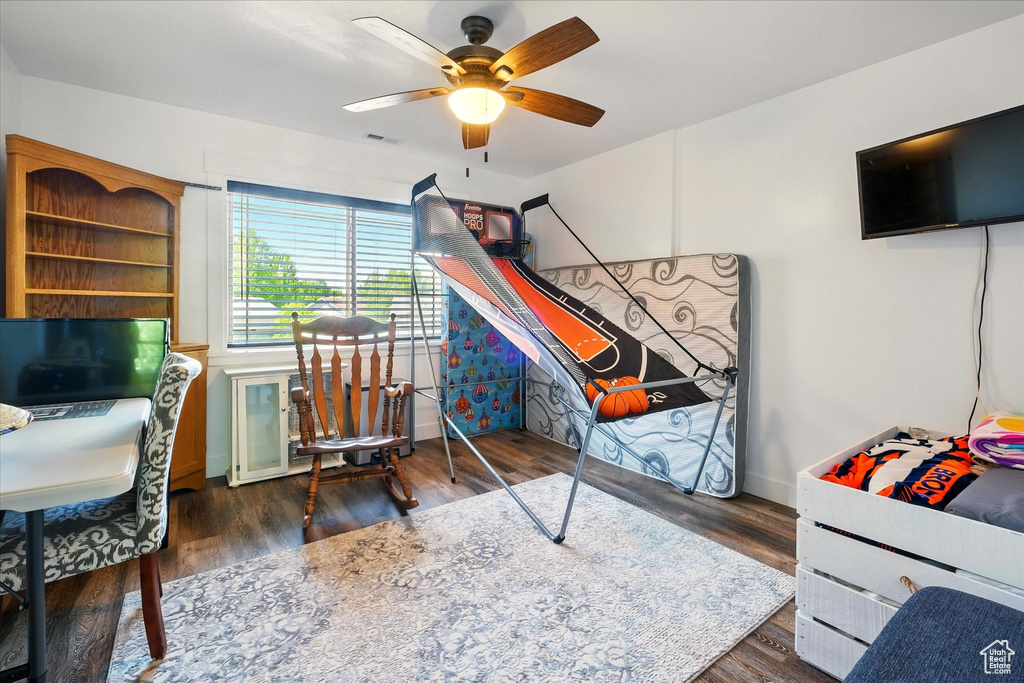 Bedroom featuring wood finished floors