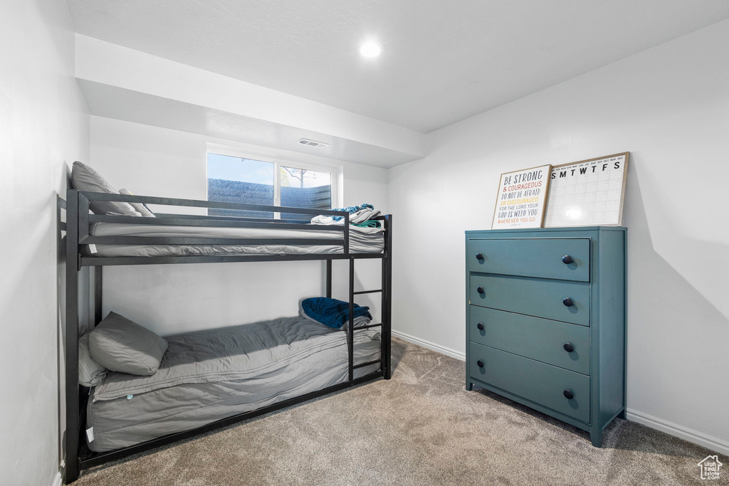 Bedroom featuring carpet, baseboards, and recessed lighting