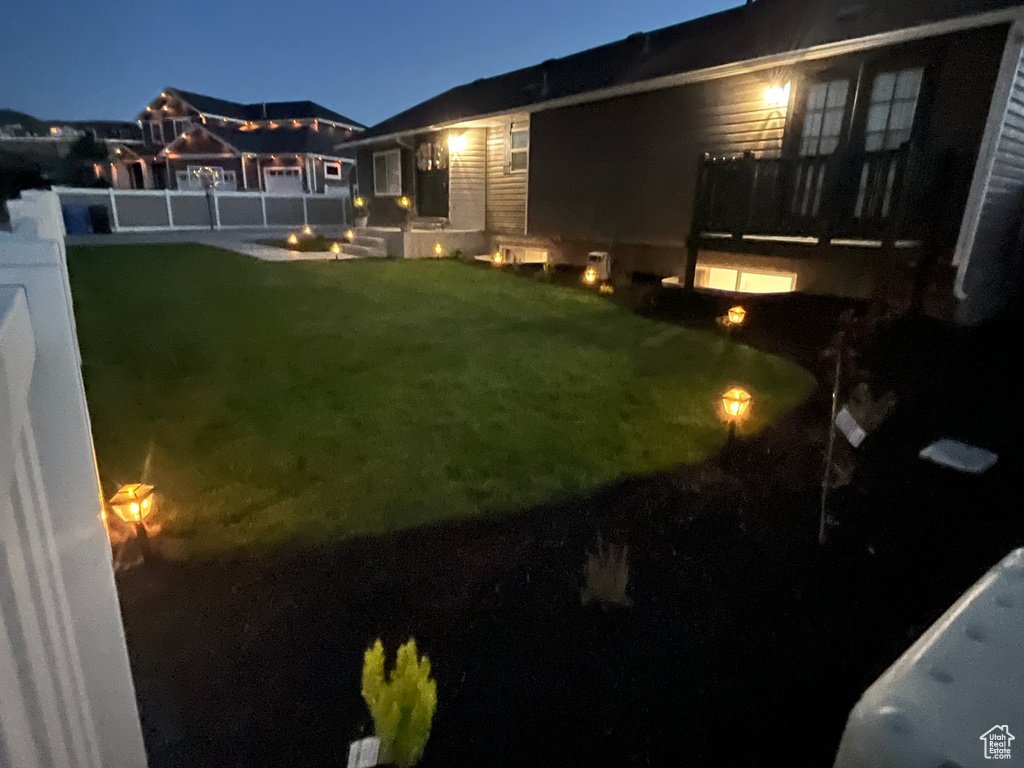 View of yard at twilight