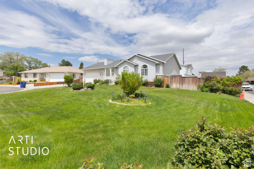 Single story home featuring an attached garage