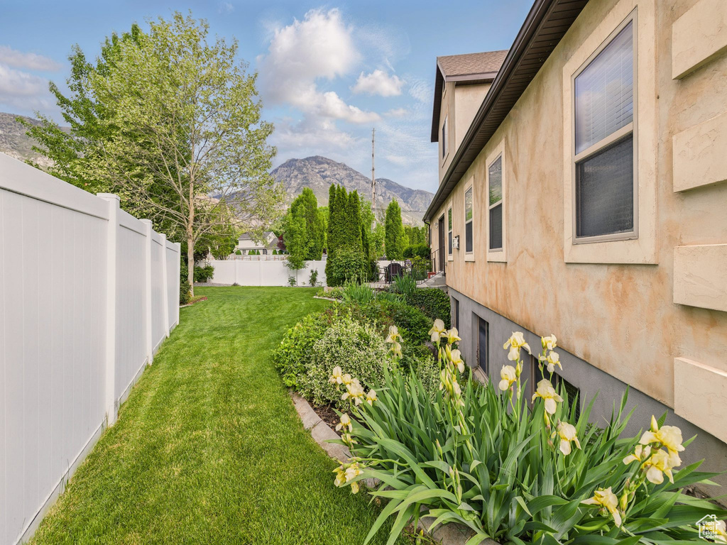 View of yard with a mountain view