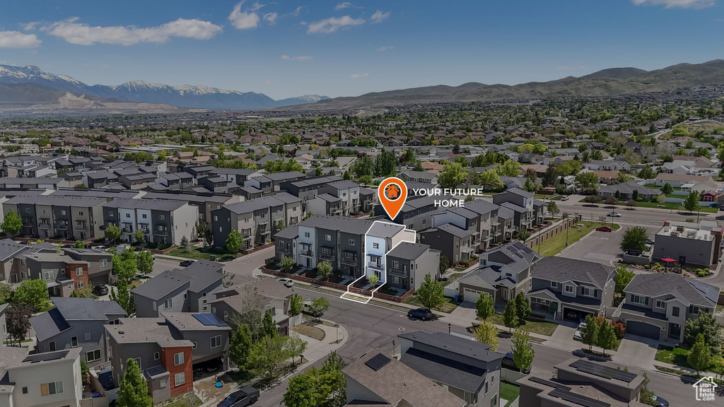 Aerial perspective of suburban area featuring mountains