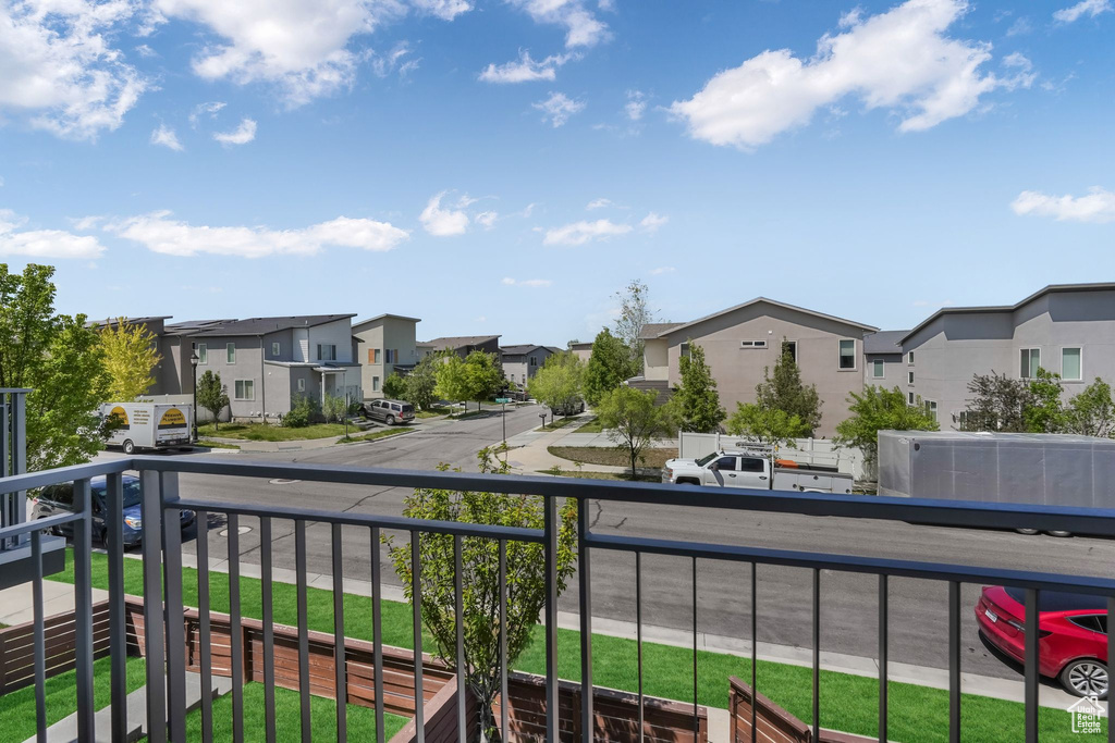 Balcony featuring a residential view