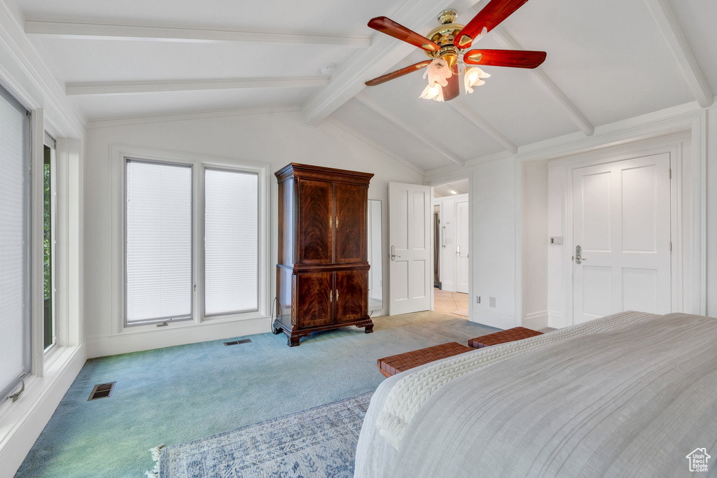 Bedroom with light carpet and a ceiling fan